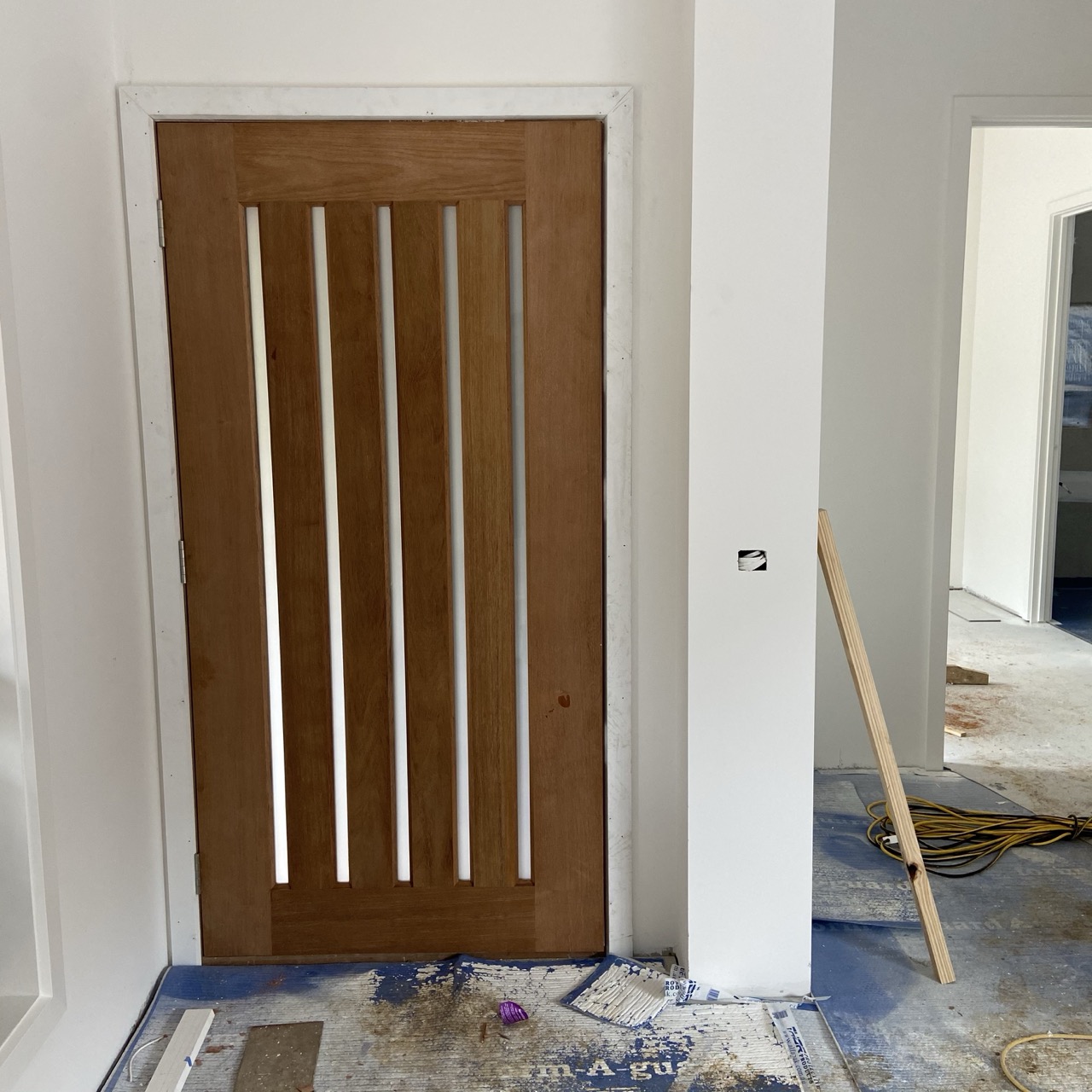 New timber front door with vertical glass panels