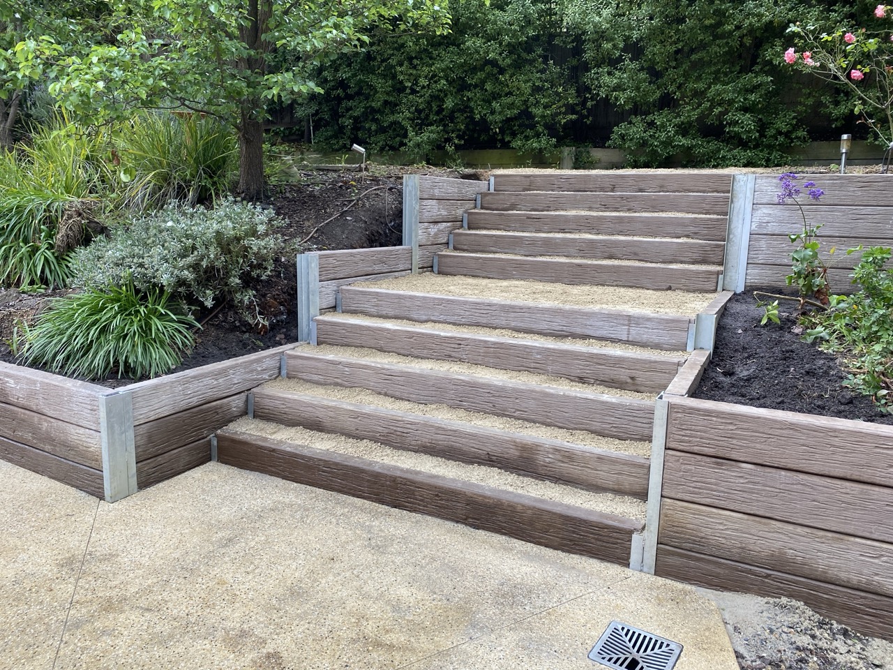 Completed retaining wall and garden stairs