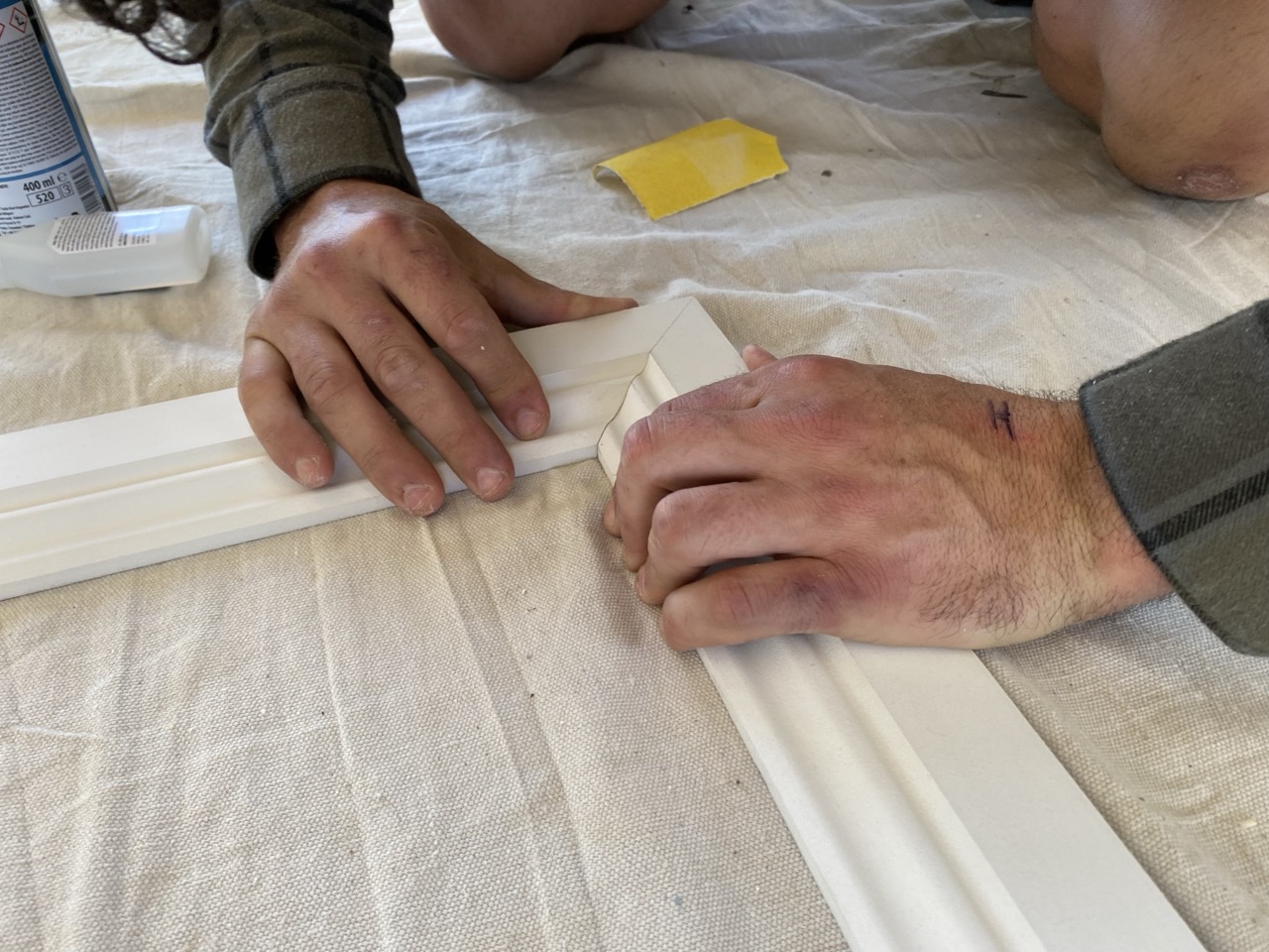 Craftsperson fitting timber architrave joints